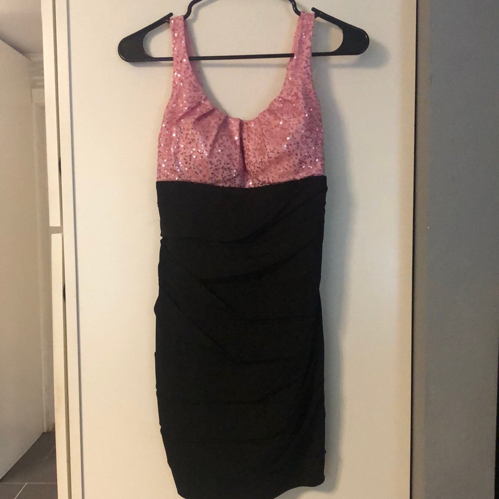Pink and black dress with sequins.